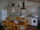 house 1 kitchen/dining area