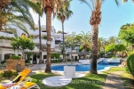 Sub tropical gardens and pool on the Golden Beach Resort in Elviria Marbella